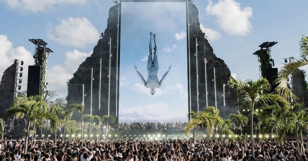 Afterlife at Zamna Tulum festival with crowd dancing in the jungle under lasers and holographic visuals